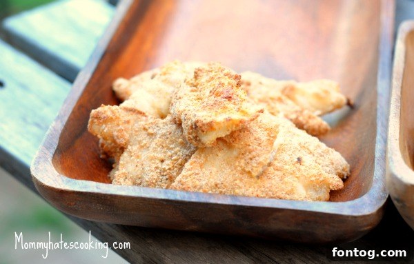 Crispy homemade fish sticks with dipping sauce, a perfect kid-friendly dinner
