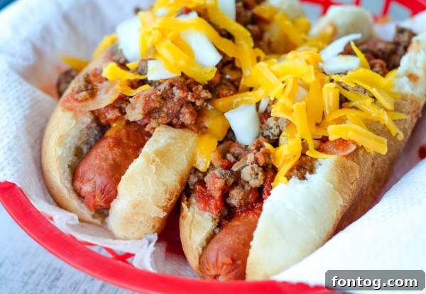 Slow cooker chili dogs in an airtight container for storage