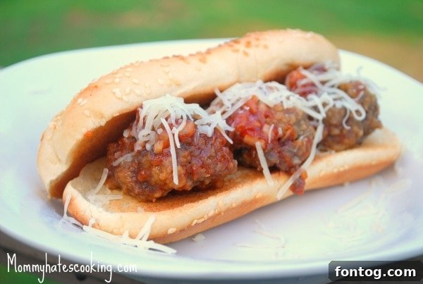 Close-up of a delicious meatball sub with melted cheese and sauce