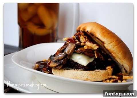cowboy burger Classic Cowboy Burger, a hearty end-of-summer meal featuring a juicy patty, crispy onion rings, and tangy BBQ sauce.