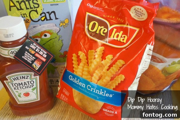 Family enjoying a Dip Dip Hooray backyard picnic setup