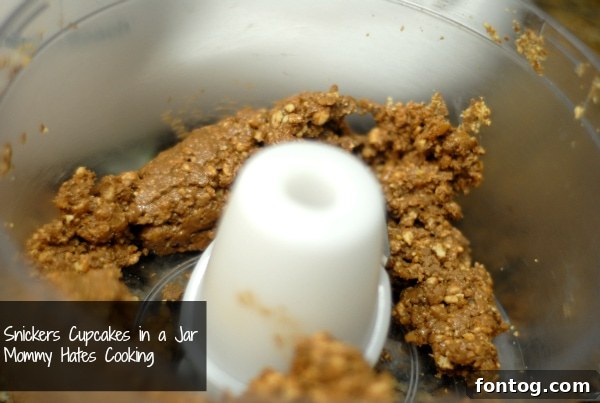 snickers cupcake ingredients prepped All ingredients for Snickers cupcakes in a jar, ready for preparation