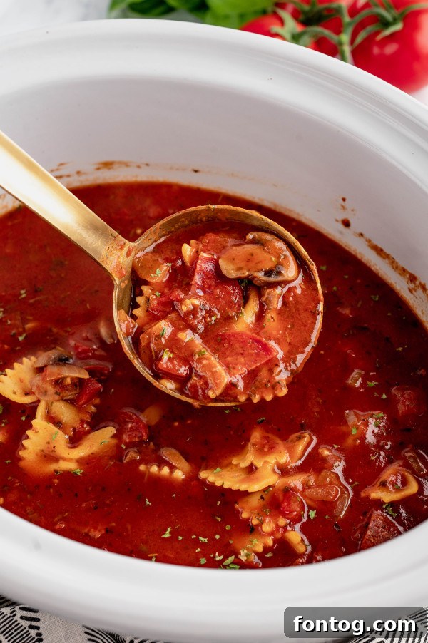 slow cooker pizza soup in a bowl