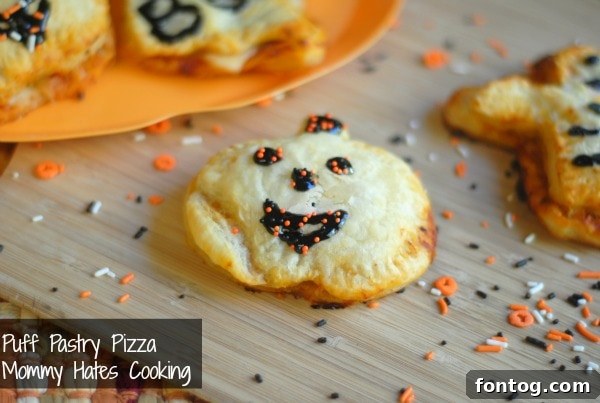 halloween pizza pockets Delicious Halloween Pizza Pockets, a festive and fun meal for the holiday season.