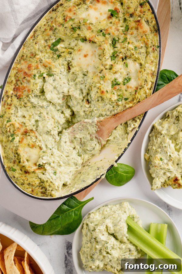 Irresistible Gluten Free Spinach Artichoke Dip 4 Fresh gluten-free spinach artichoke dip with corn chips