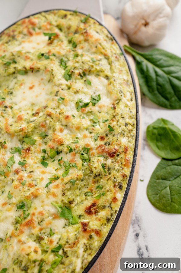 Irresistible Gluten Free Spinach Artichoke Dip 7 Mixing ingredients for spinach artichoke dip