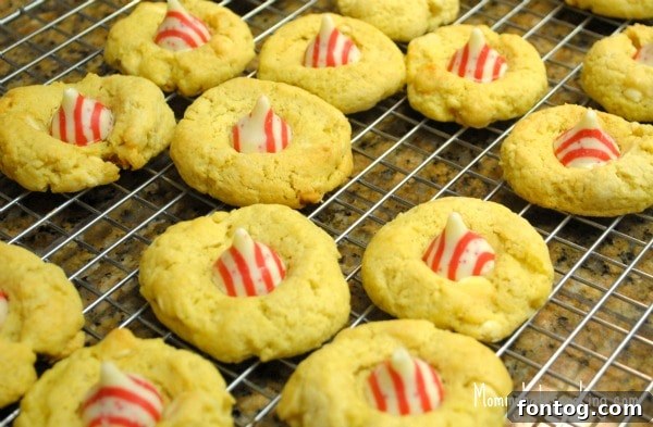 Truvia Sweetened White Chocolate Peppermint Kisses Cookies and Grocery Giveaway 4 Assortment of White Chocolate Candy Cane Kisses Cookies on a cooling rack, ready for holiday enjoyment