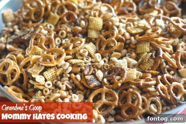 Close-up of Grandma's Goop or Holiday Party Mix with a variety of crunchy cereals and pretzels, perfect for holiday snacking.