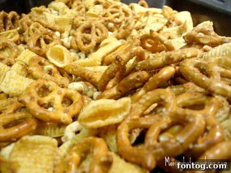 Savory party mix in a bowl, perfect for snacking