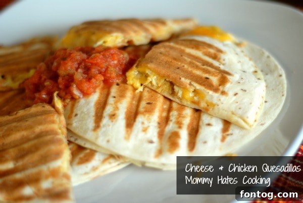 Crispy Chicken and Cheese Quesadillas, ready to serve with a side of salsa
