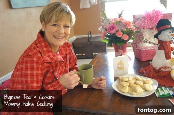 A delightful spread featuring various Bigelow Teas alongside a plate of Moravian Tea Cookies, ready for a cozy tea time.
