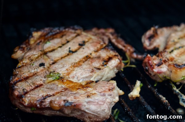 Bottle of Marsala cooking wine next to grilled steak