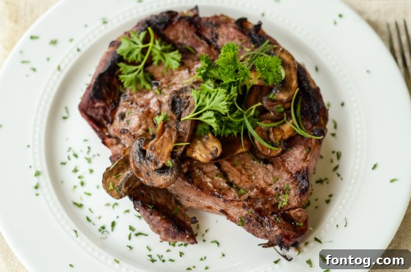 Two grilled steaks marinating in a bag