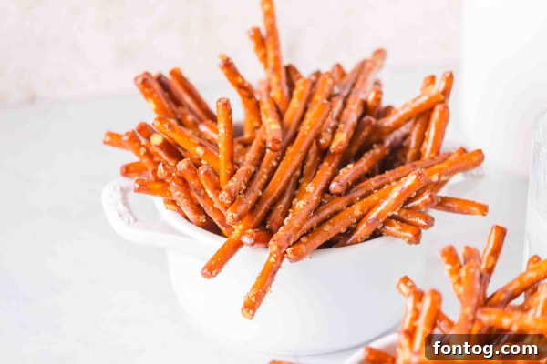 how to make seasoned pretzels gluten free, showing a bowl of finished pretzels