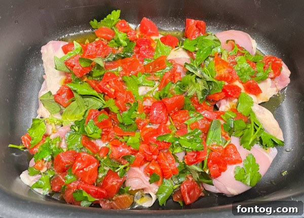close-up of raw chicken in a slow cooker, ready for cooking