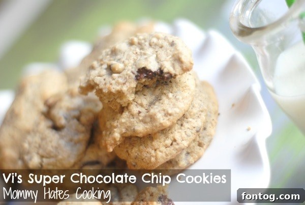 A batch of freshly baked Vi's Super Chocolate Chip Cookies, golden and inviting.