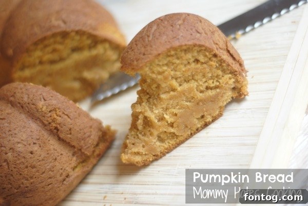 Close-up of fluffy pumpkin bread with powdered sugar