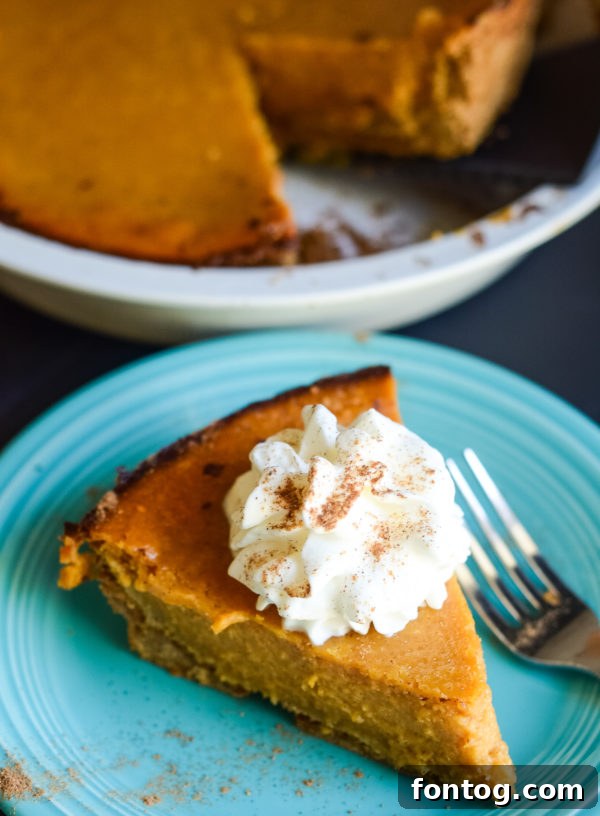 Simply Divine Gluten-Free Pumpkin Pie 2 Delicious Gluten-Free Pumpkin Pie with a golden crust, ready to be served at a holiday gathering.