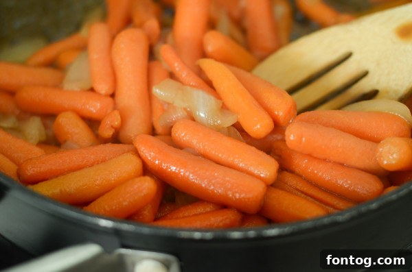 A jug of real apple cider, the key ingredient for sweet and savory glazed carrots.