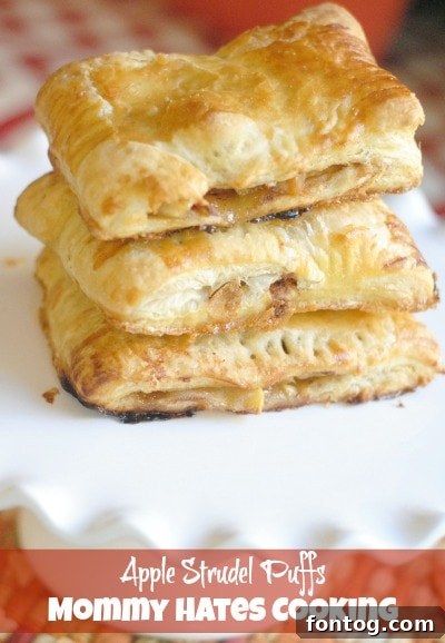 Finished apple strudel puffs on a plate, ready to be enjoyed