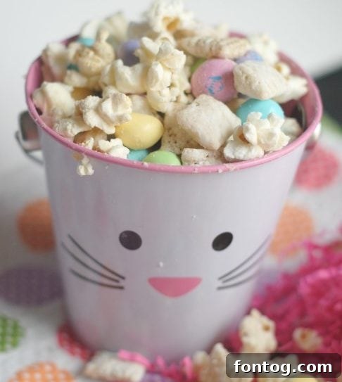 Vibrant Spring Puppy Chow Mix in a bowl, perfect for Easter and spring gatherings.