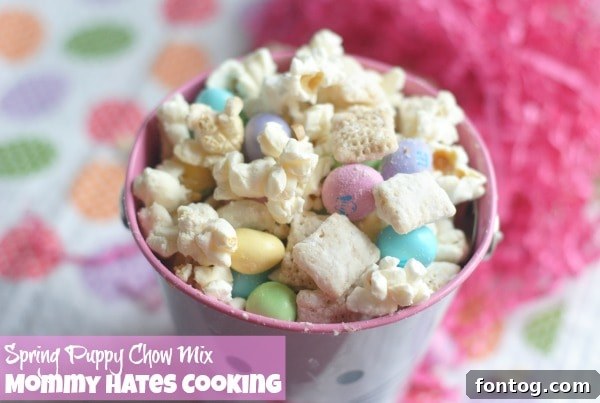 Close-up of Spring Puppy Chow Mix with colorful candies in a decorative bunny tin, ideal for Easter table.