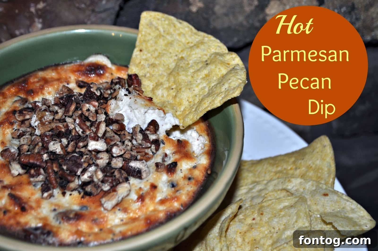 A delightful Hot Parmesan Pecan Dip, perfect for any gathering, served with crackers.