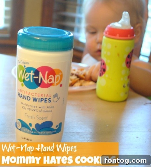 Happy toddler making a mess with BBQ chicken