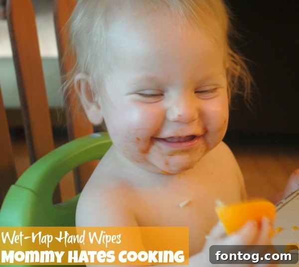 Adorable toddler covered in BBQ sauce