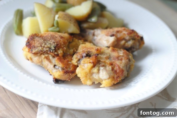 Crispy Buttermilk Oven Fried Chicken, a healthier baked alternative to traditional fried chicken.