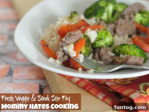 Sizzling Steak and Fresh Vegetable Stir Fry featuring Pompeian 6 Delicious Steak Stir Fry Served Over Rice