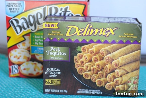 Easy Hawaiian Pizza Bagel Sliders 3 Assortment of Bagel Bites on a baking sheet, ready for the oven