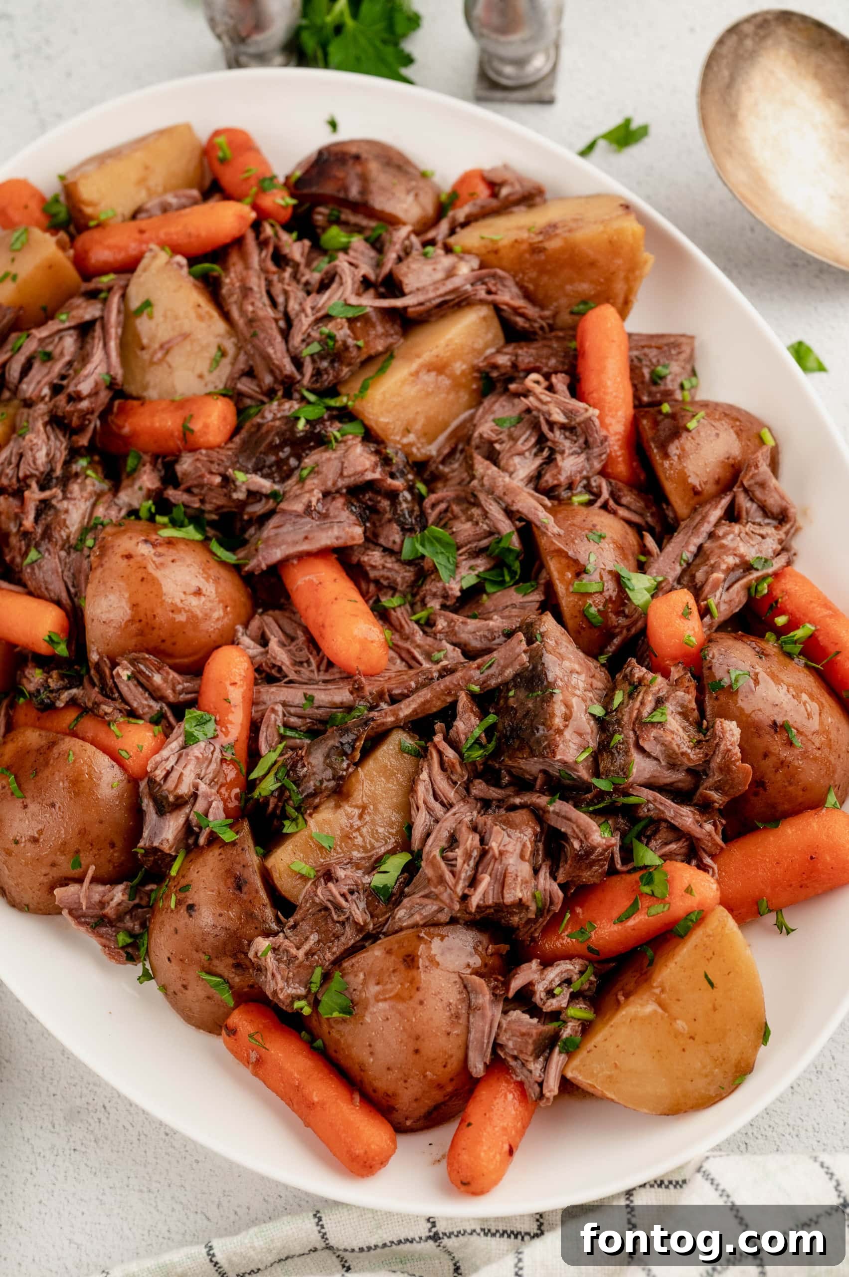 4-Ingredient Slow Cooker Roast Beef served with vegetables