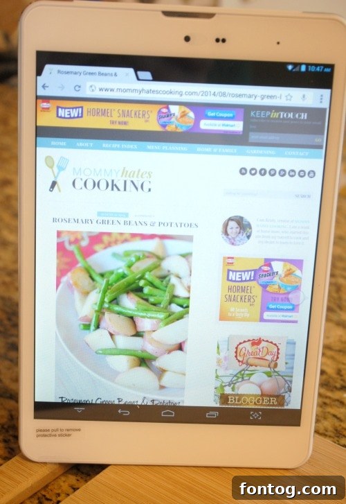 Mom using T-Mobile Tablet for work