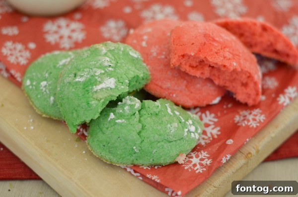 31 Joyful Christmas Cookie Recipes 5 Christmas cookies shaped and decorated to look like festive packages, adorned with sprinkles and icing, ready for a holiday treat.
