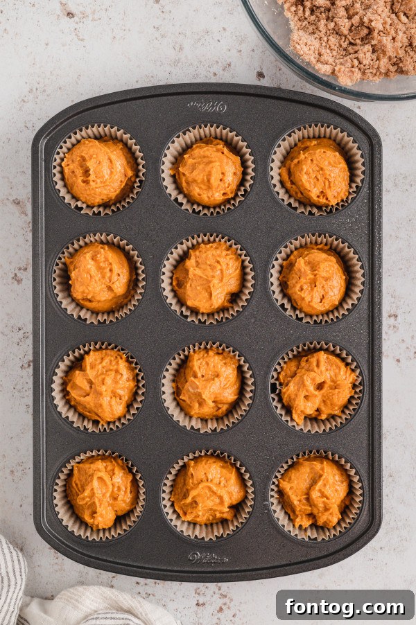 Close-up of a can of pure pumpkin puree, essential for the muffins