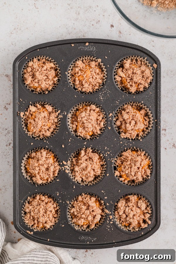 Preparing the buttery, cinnamon-sugar crumb topping for muffins