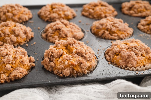 Stack of gluten-free pumpkin muffins, ready to be frozen
