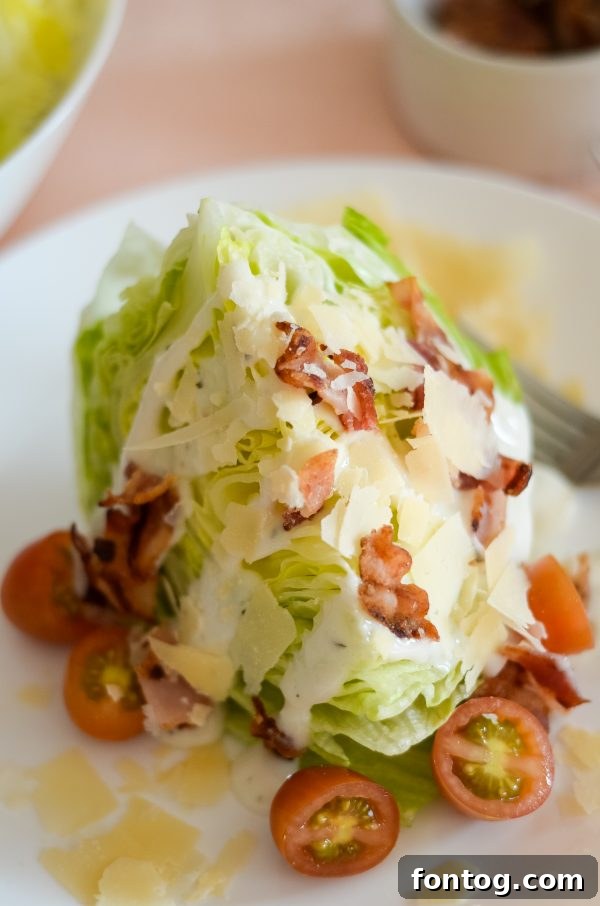 Delicious Wedge Salad with crispy bacon and tomatoes, perfect with grilled steak