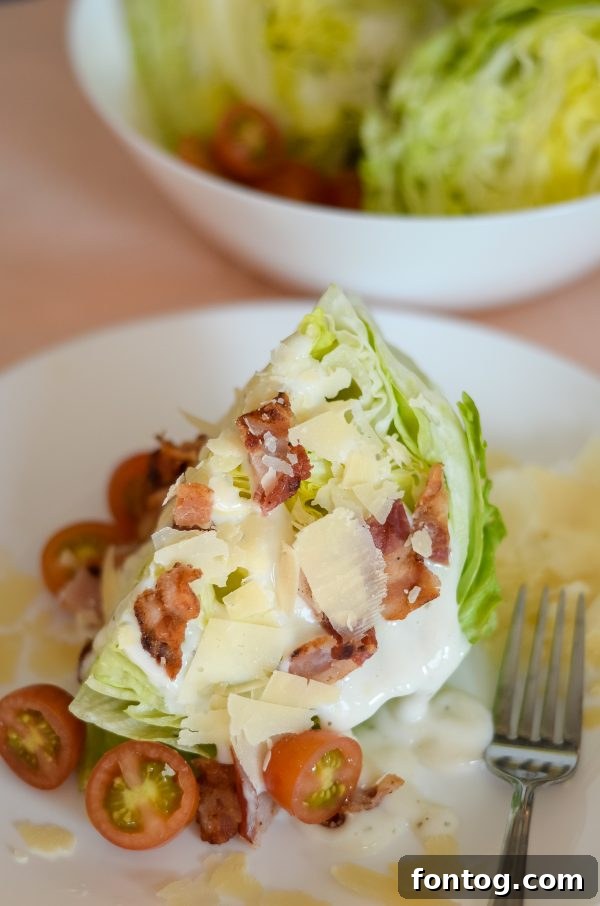 Gourmet wedge salad with various toppings
