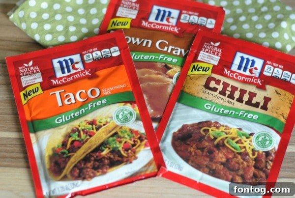 Serving spoons dipping into a pot of Gluten-Free Chicken & Corn Chili