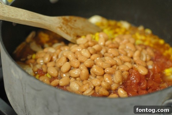 Table spread with chili, cornbread, and toppings for a party