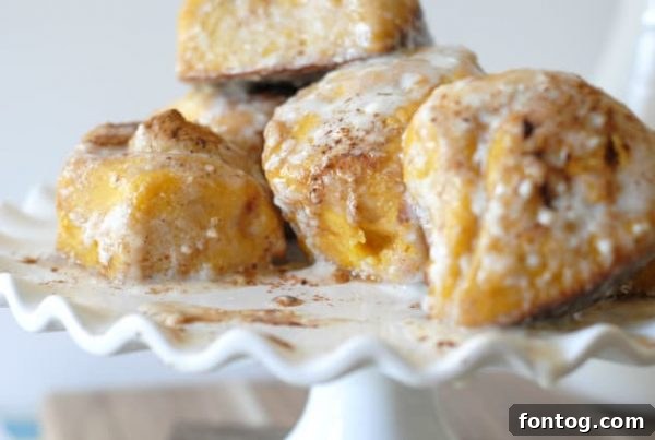 Autumn Spice Swirls 3 Warm pumpkin cinnamon rolls with glaze