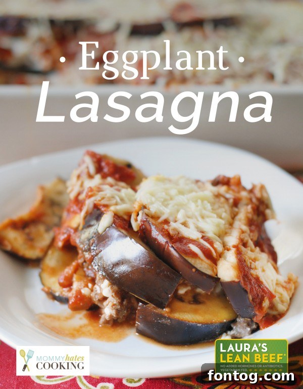 Savory Eggplant Lasagna with layers of rich tomato sauce, melted cheeses, and perfectly cooked eggplant slices, garnished with fresh herbs.