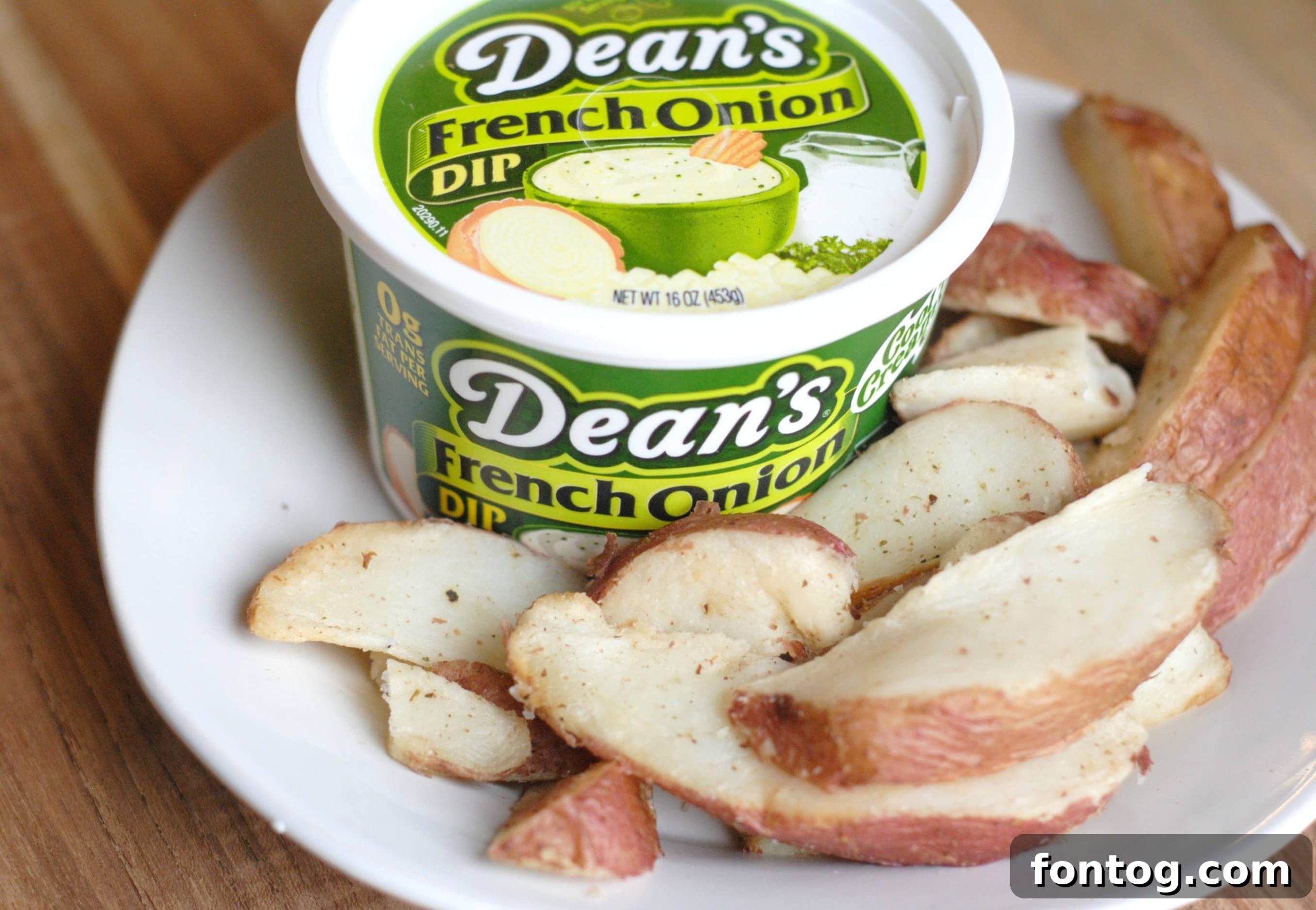 Dean's Dip Buffalo Ranch, French Onion, and classic Ranch flavors displayed alongside an array of colorful, fresh vegetables such as carrots, celery sticks, and vibrant bell peppers, promoting healthy and appealing snack choices.