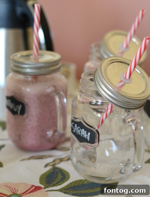 Effortless Party Breakfasts: Berry Orange Smoothies and More 15 A close-up of a refreshing Berry Orange Smoothie, showing the smooth texture and vibrant color, ready to be enjoyed as part of a delicious breakfast.