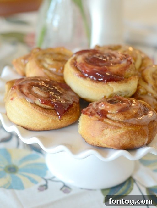 Effortless Party Breakfasts: Berry Orange Smoothies and More 19 Fresh white and pink flowers elegantly arranged in vintage milk bottles, serving as a charming and simple centerpiece for a breakfast or brunch table.