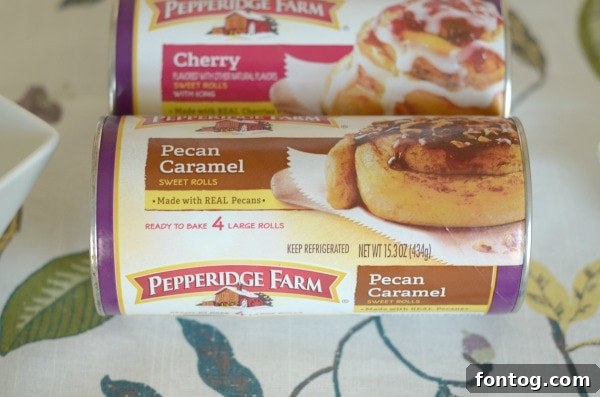 Effortless Party Breakfasts: Berry Orange Smoothies and More 4 Assorted Pepperidge Farm Sweet Rolls, including Apple Cinnamon, Pecan Swirl, and Cherry, neatly arranged on a tray, ready to be served at a brunch.