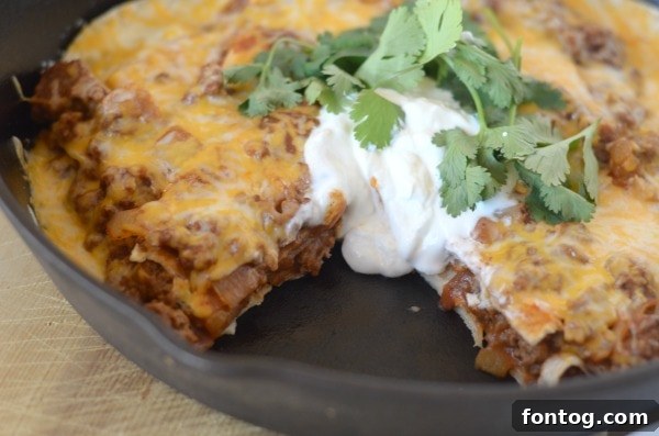 Enchilada Casserole ready to be topped