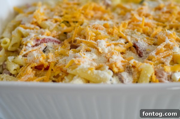 mixing ingredients for baked chicken florentine